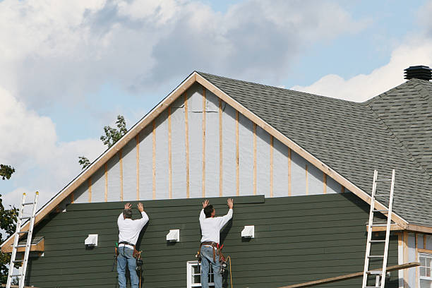 Professional Siding technician working in Danville, PA